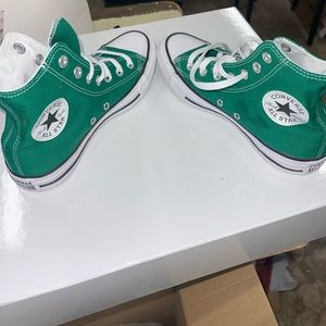 Never before worn Women’s Converse shoes.